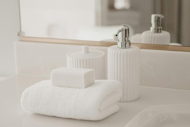 Guest House Insurance Hotel bathroom amenities representing facilities covered by hotel and guest house insurance